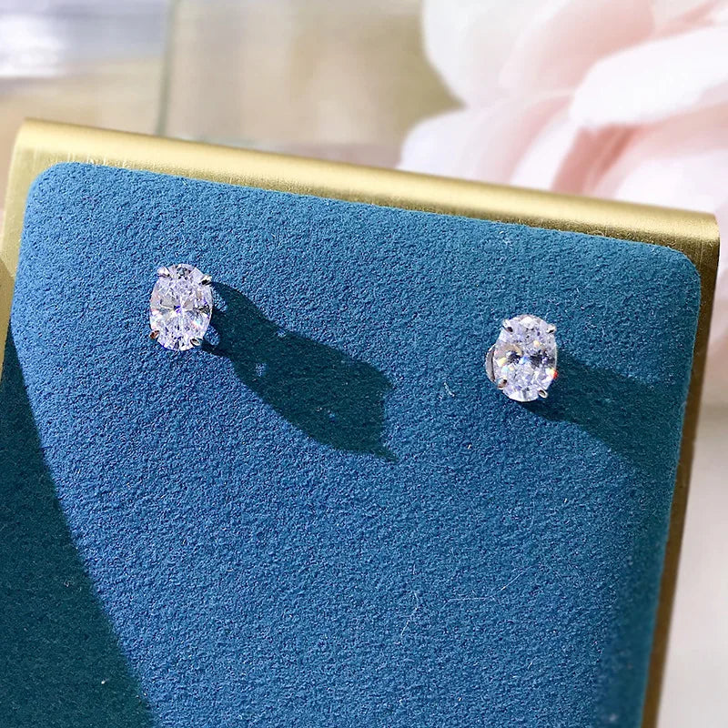 Shiny Oval CZ Stud Earrings for Women | Classic Elegance | Novexa